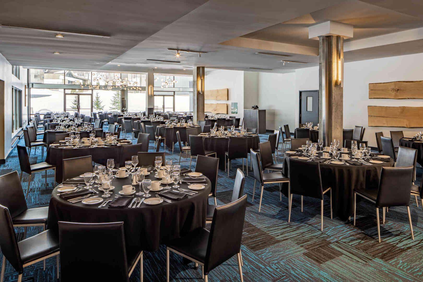 What are the advantages of renting a room for corporate events?